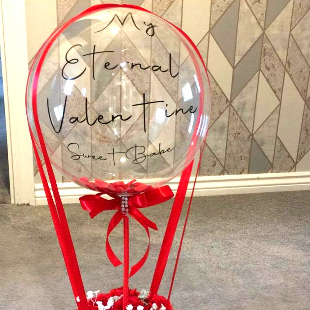 Personalised clear bubble balloon gift with red roses in a heart box